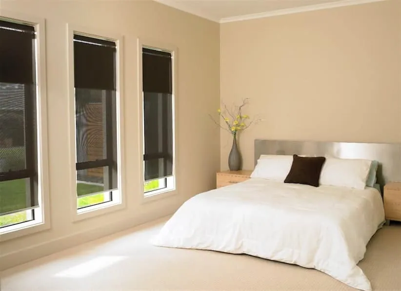 Blockout roller blinds fitted to bedroom windows