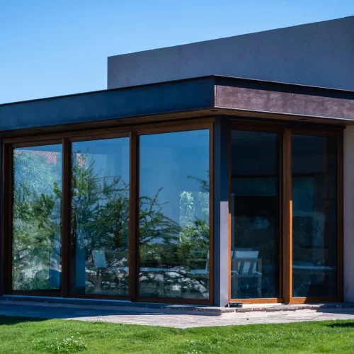 Glass sliding doors on a modern home exterior