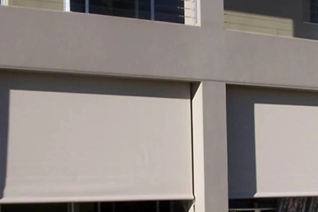 Straight drop awnings on a rendered wall