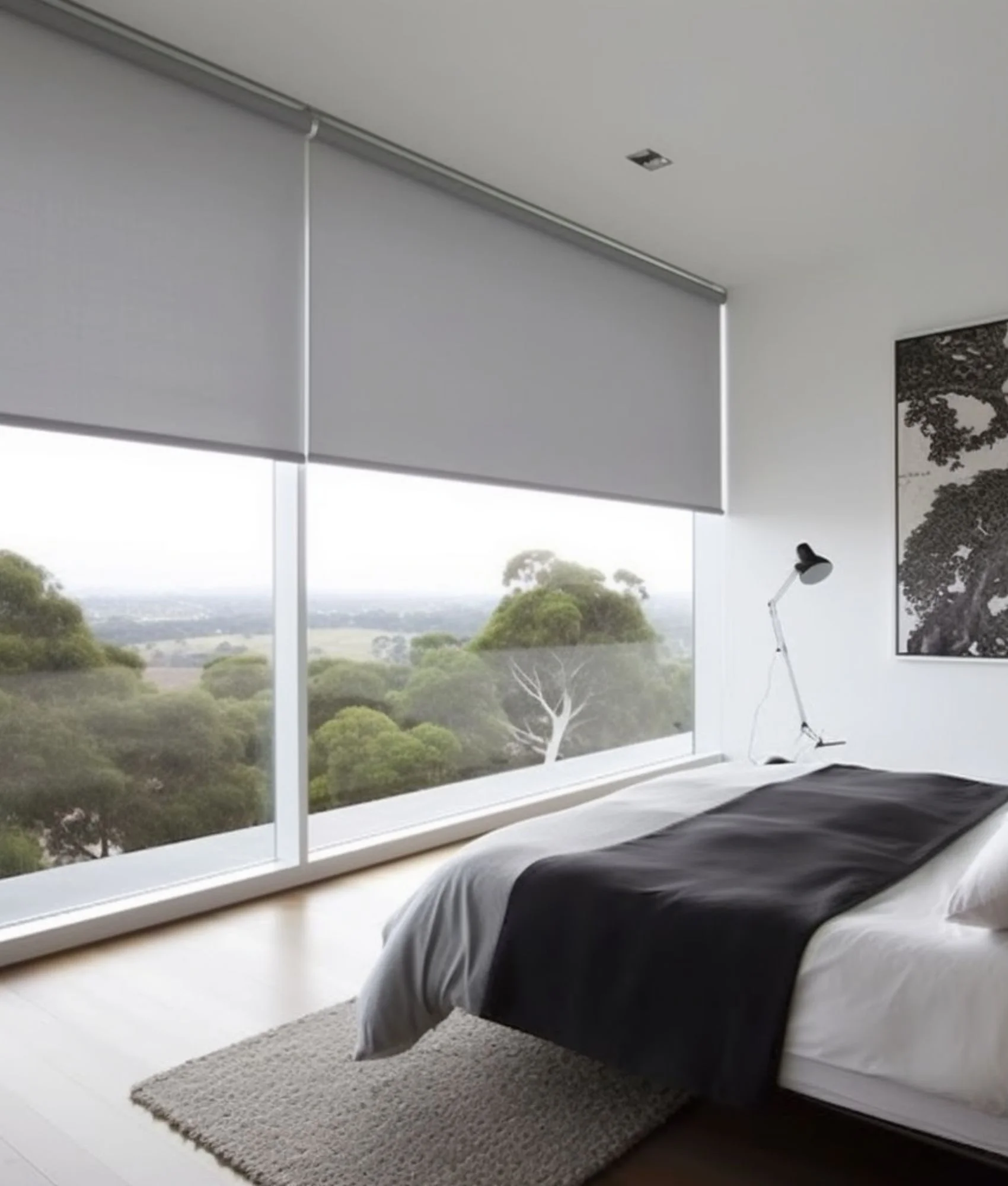 Roller blinds across the windows of a bedroom