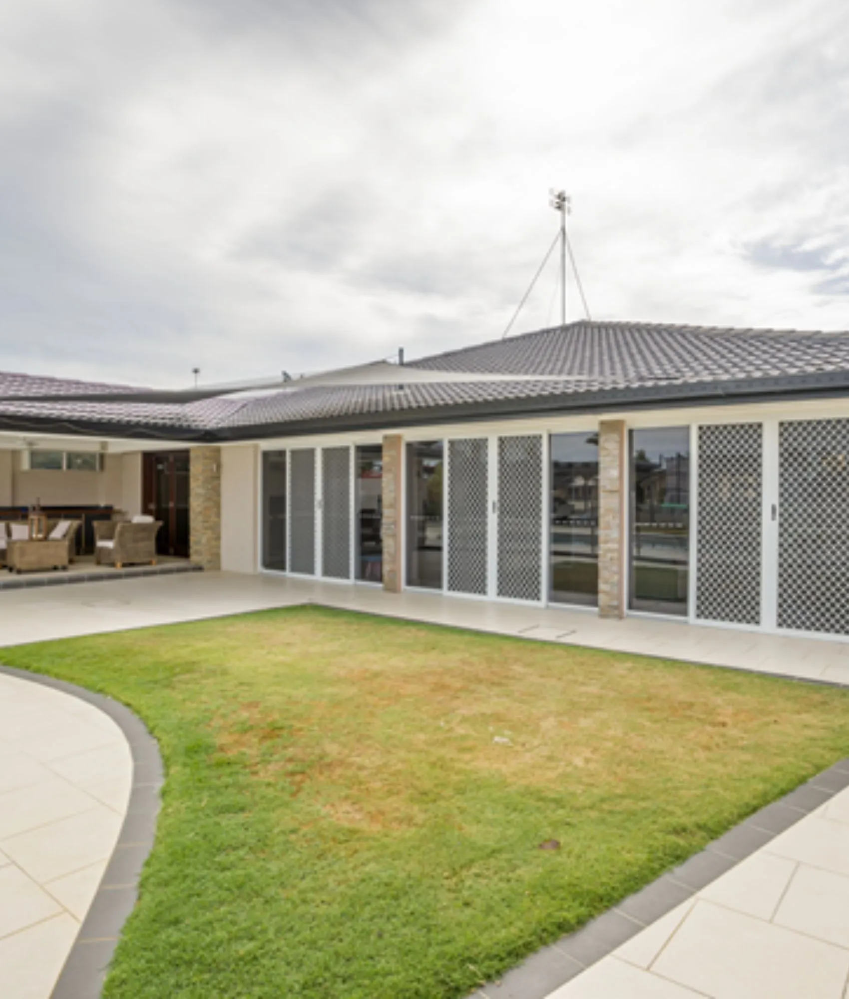 Security window screens on a home's sliding patio doors