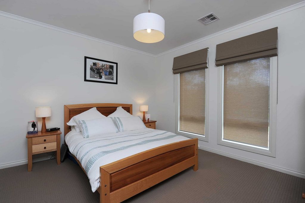 Stanbond SA - Blinds Adelaide - Image of brown bedroom roman blinds