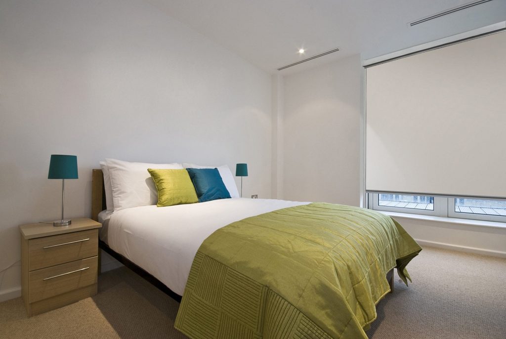 Stanbond SA - Blinds Adelaide - Image of modern bedroom roller blinds