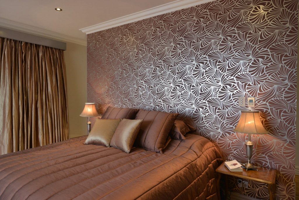 Stan Bond SA - Curtains Adelaide - Image of traditional curtains in a modern bedroom with geometric wallpaper